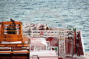 Ice of the ship and ship structures after swimming in frosty weather during a storm in the Pacific Ocean.