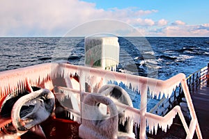 Ice of the ship and ship structures after swimming in frosty weather during a storm in the Pacific Ocean.