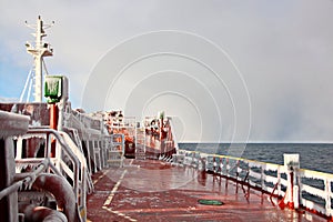 Ice of the ship and ship structures after swimming in frosty weather during a storm in the Pacific Ocean.