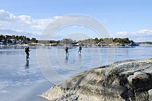 Ice skaters in Stockholm archipelago