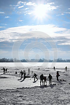 Ice-skating on frozen lake