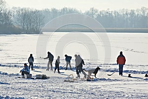 Ice-skating on frozen lake photo