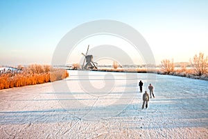 Ice skating at Kinderdijk in Netherlands