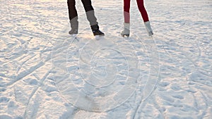 Ice skating teenagers feet outdoors