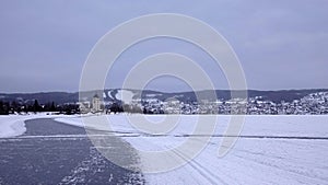 Ice skating trail on lake Siljan to Rattvik in Dalarna in Sweden photo