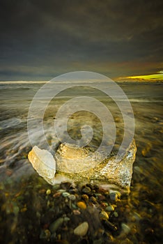 Ice in Surf at Dusk.