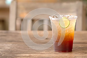 Ice tea with lemon and honey summer drink