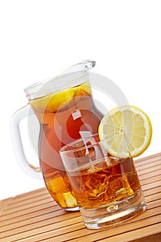 Ice tea with lemon pitcher