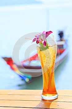 Ice tea. Tropical cocktail on long tail background