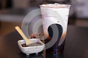 Ice thai tea in the plastic cup