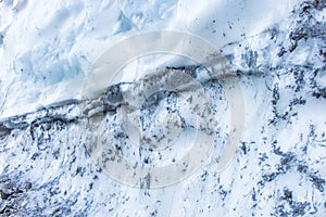 Ice wall close up. Melting glacier in Germany, macro. Global warming concept. Frozen water, backdrop. Majestic ice surface.