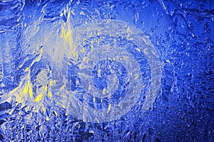 Ice window frosted blue abstract background winter