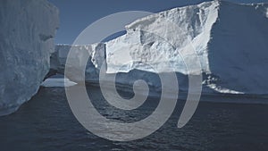 Iceberg arch antarctic ocean glacier seascape