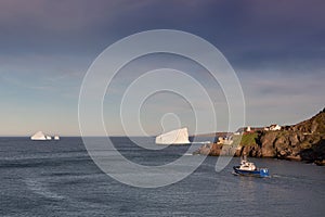 Iceberg, Fishing Boat and Lighthouse