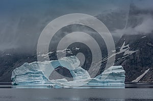 Iceberg in the fjords of Scoresby Sund, East Greenland photo