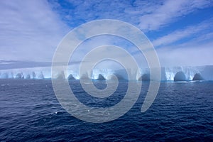Iceberg Floating in Antarctica on a calm sea