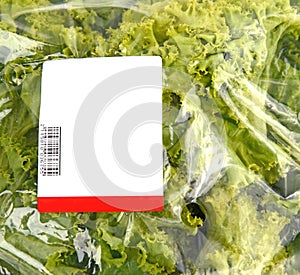 Iceberg lettuce in plastic bag package