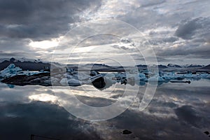 Iceberg Reflections in Glacier Lagoon photo