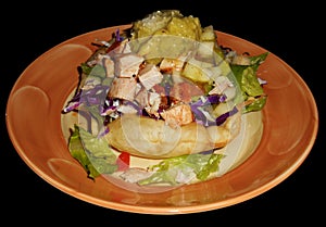 Iceberg salad with chicken, tomato and guacamole sauce, isolated