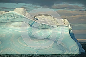 Iceberg with surrealistic blue swirls