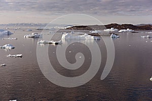 Icebergs on arctic ocean in Greenland