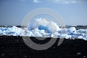 Icebergs on the black volcanic beach