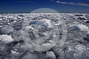 Icebergs and brash ice, Antarctica photo