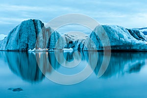 Icebergs with candles, Jokulsarlon ice lagoon before annual firework show, Iceland