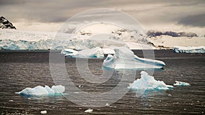 Icebergs floating around in the Errera Channel behind Cuverville Island, Antarctica.