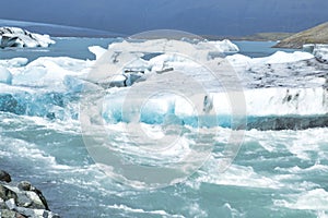 Icebergs floating in the cold water of the Jokulsarlon glacial lagoon. Vatnajokull National Park, in the southeast