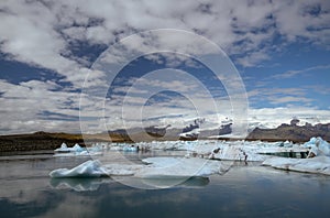 Icebergs floating on the river from the Jokulsarlon Glacier Lagoon to the ocean, without people. Iceland