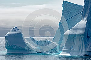 Icebergs in Greenland. Huge Iceberg building with tower.