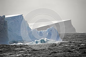 Icebergs in rough waters