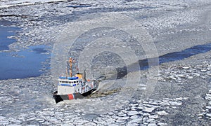 Icebreaker ship in frozen Hudson river