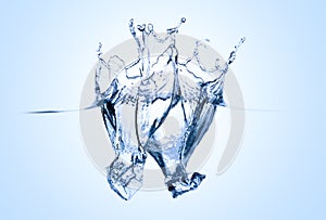 Icecubes splashing into water