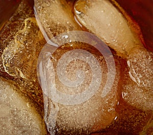 Icecubes in wiskey photo