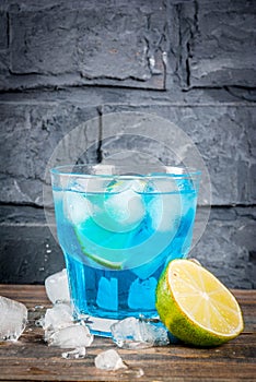 Iced blue alcohol cocktail