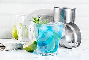 Iced blue alcohol cocktail