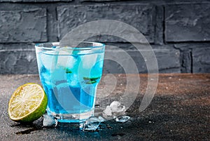 Iced blue alcohol cocktail