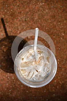 Iced cappuccino coffee with sunlight in summer