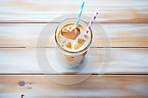 iced chai latte with a heart drawn in froth top