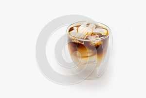 Iced coconut coffee in double walls glass isolated on white background