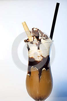 Iced coffee with chocolate sauce and ice cream