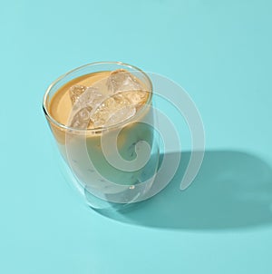 Iced Coffee on a cyan background