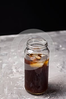 Iced coffee drink in a glass botle