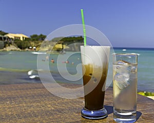Iced coffee in an exotic beach