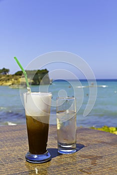 Iced coffee in an exotic beach