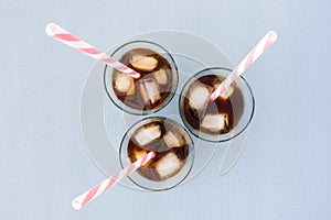 Iced Coffee, Ice Cubes and Straws in Glasses