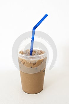 Iced coffee latte in takeaway cup