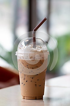 Iced coffee with milkshake, Summer refreshment drinks on desk background in cafe